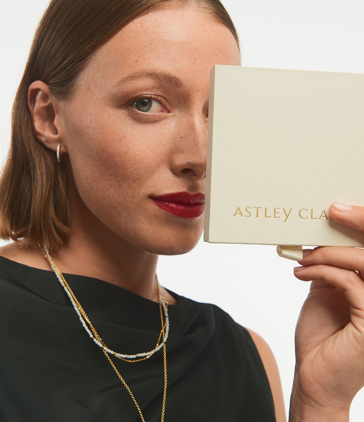 Still life of celestial jewellery pieces