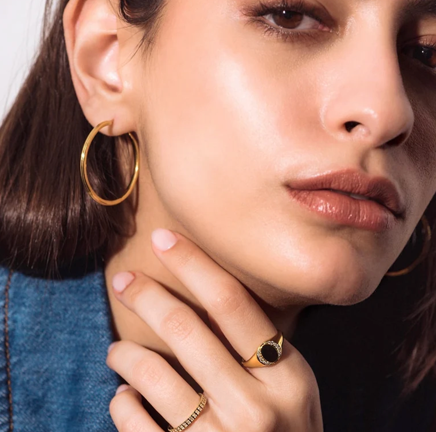 gold signet ring and gold hoops