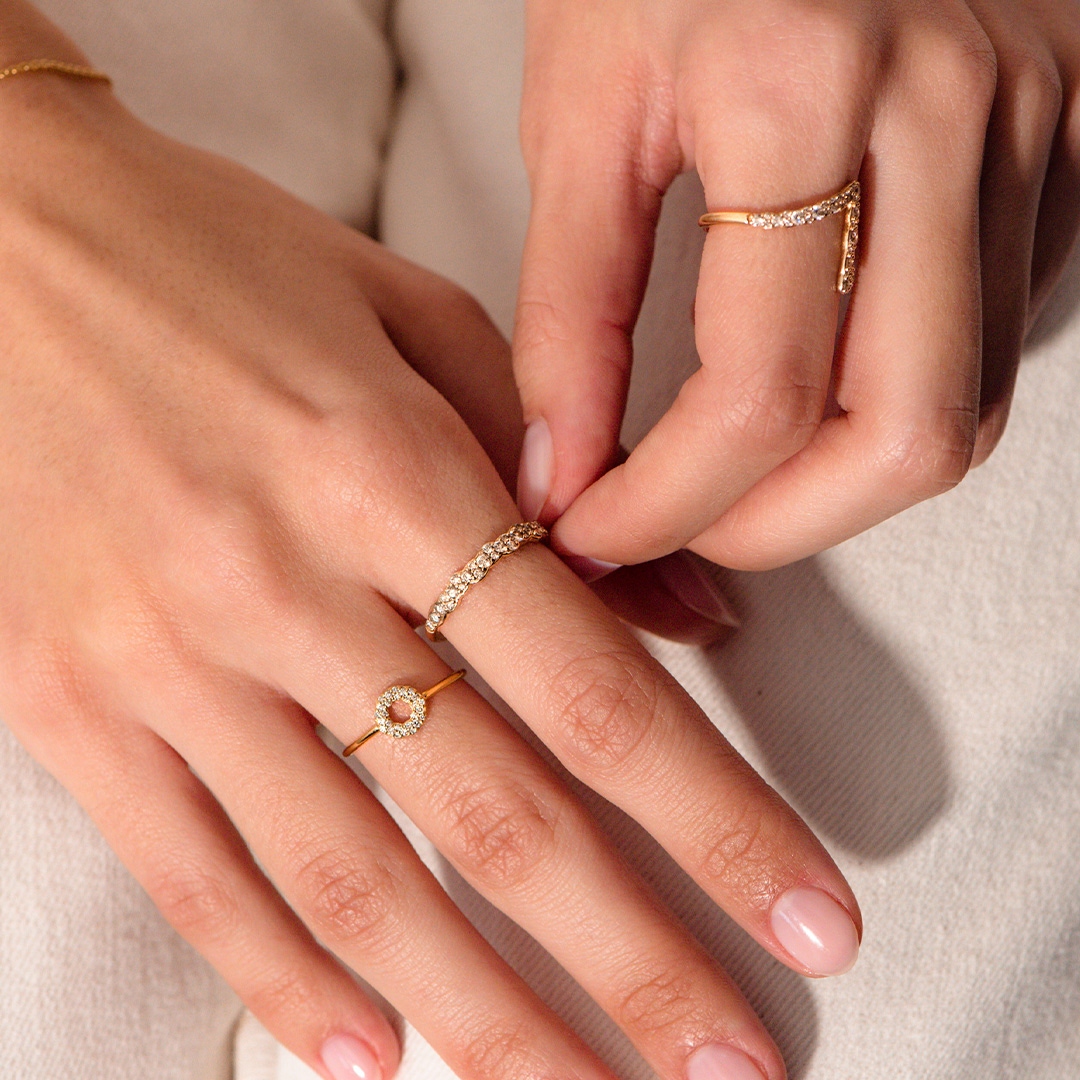 model wearing white gold eternity ring
